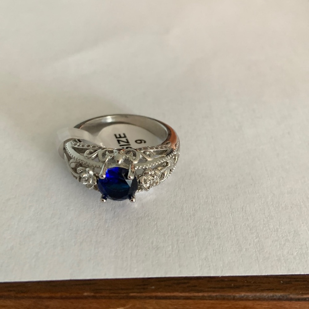 Ring silver look with blue stone size 9 new